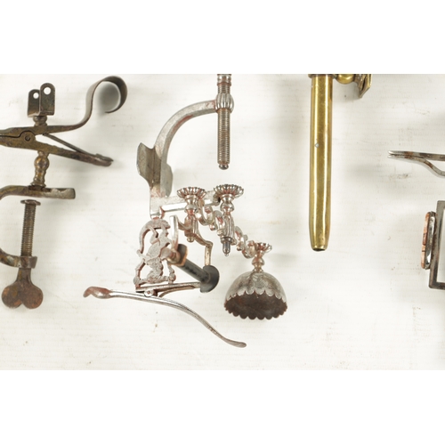 1017 - A COLLECTION OF 18TH CENTURY CUT STEEL SEWING CLAMPS comprising one by Joseph Rodgers of various des... 