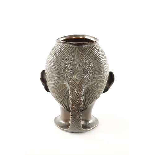 1020 - K. K. KUNST-ERGIESSEREI, WIEN. A STYLISH EARLY 20TH CENTURY AUSTRIAN PATINATED BRONZE VASE depicting... 