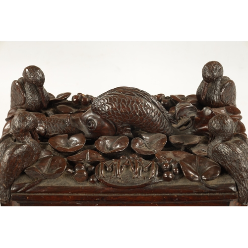 1039 - AN IMPRESSIVE 18TH CENTURY CONTINENTAL CARVED HARDWOOD TABLE CASKET concave canted corners below a h... 