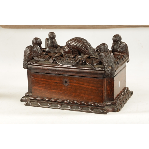 1039 - AN IMPRESSIVE 18TH CENTURY CONTINENTAL CARVED HARDWOOD TABLE CASKET concave canted corners below a h... 