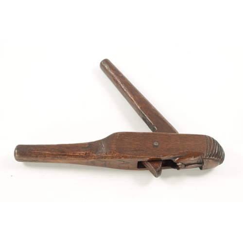 1043 - A PRIMITIVE MID 18TH CENTURY FOLK ART NUT CRACKER modelled as a man head initialled A.J. and dated 1... 