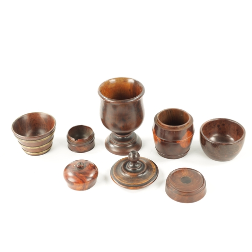 1049 - A COLLECTION OF FIVE 19TH CENTURY TREEN WARE ITEMS comprising A PEDESTAL CUP AND COVER, A Lignum Vit... 