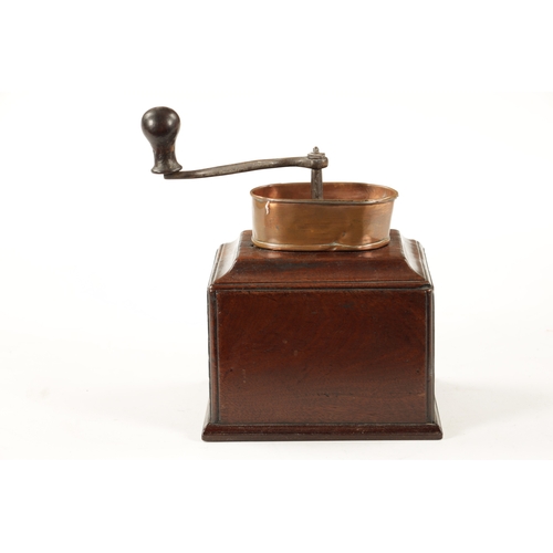 1055 - AN 18TH CENTURY MAHOGANY COFFEE GRINDER with ironwork handle and oval copper pan above a moulded edg... 