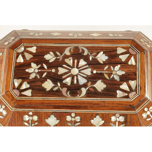 1057 - AN EARLY 18TH CENTURY SOUTH AMERICAN MOTHER OF PEARL INLAID BOX the rosewood box of geometric design... 