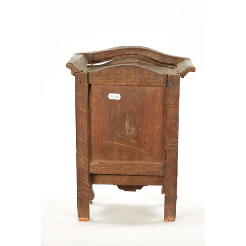 1061 - AN 18TH CENTURY FRUITWOOD MINIATURE ARMOIRE with panelled doors and frieze drawer to the base. (36.5... 