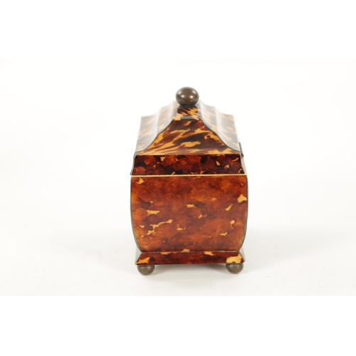 1065 - A 19TH CENTURY TORTOISESHELL TEA CADDY OF SMALL SIZE the finely patinated body with pewter lined edg... 