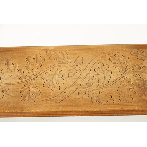 1068 - A GOOD 19TH CENTURY BLACK FOREST LINDEN WOOD CARVED BEAR HALL BENCH having two standing bear support... 