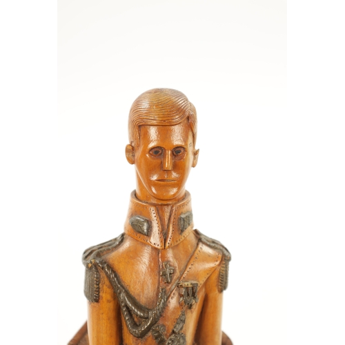 1080 - AN UNUSUAL CARVED BOXWOOD FIGURE OF NAPOLEON in full uniform seated in a chair (21cm high )