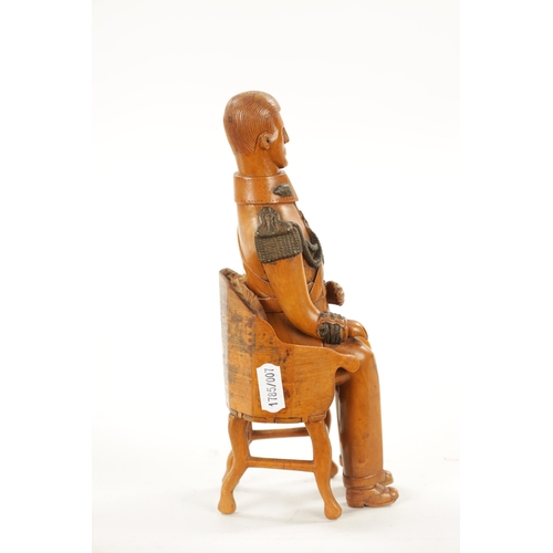 1080 - AN UNUSUAL CARVED BOXWOOD FIGURE OF NAPOLEON in full uniform seated in a chair (21cm high )