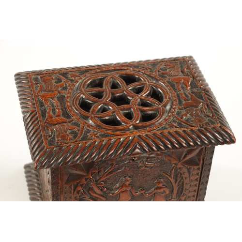 1084 - A 19TH CENTURY FOLK ART CARVED FRUITWOOD LIDDED BOX dated 1603 on the reverse and depicting biblical... 