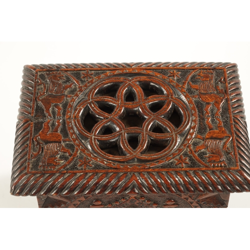 1084 - A 19TH CENTURY FOLK ART CARVED FRUITWOOD LIDDED BOX dated 1603 on the reverse and depicting biblical... 