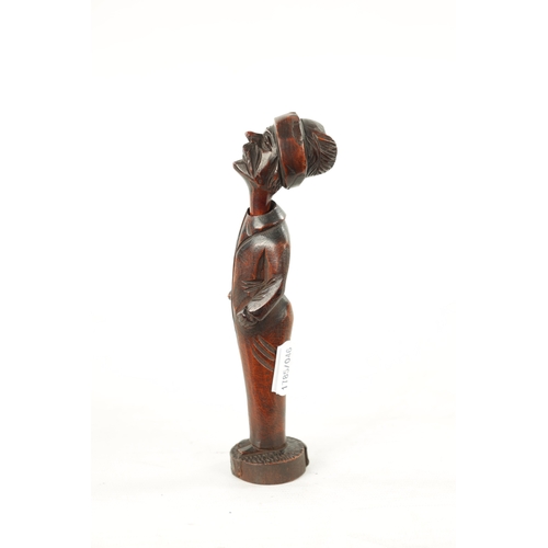 1086 - A 19TH CENTURY CONTINENTAL CARVED FRUITWOOD FIGURAL PIPE AND STAND with inset glass eye (one missing... 