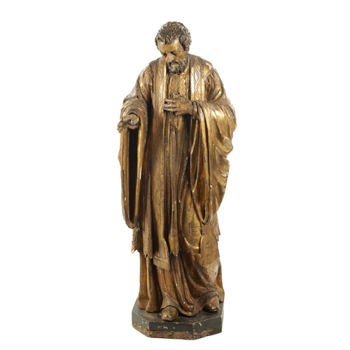 1087 - AN EARLY 17TH CENTURY CARVED WOOD GILT GESSO FIGURE OF CHRIST (104cm high)