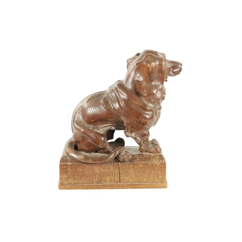 1089 - AN EARLY 20TH CENTURY ‘MOUSEMAN’ STYLE CARVED OAK SCULPTURE modelled as a seated dachund dog raised ... 