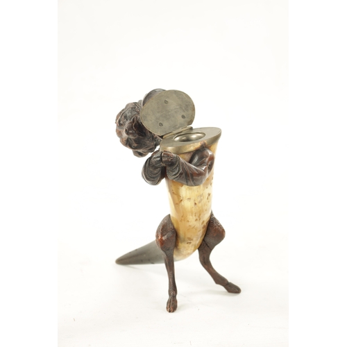 1096 - A 19TH CENTURY BLACK FORREST CARVED WOOD AND HORN INKWELL formed as a standing hooded fox with hinge... 