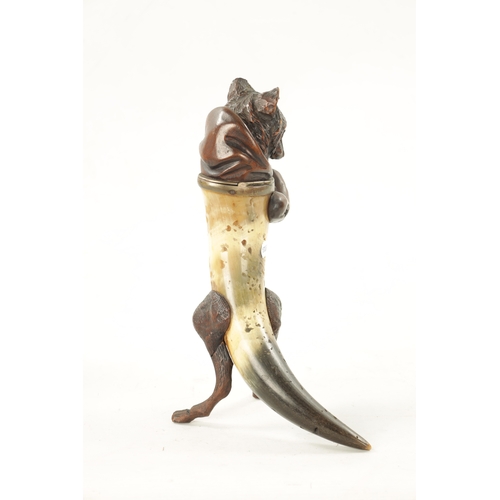 1096 - A 19TH CENTURY BLACK FORREST CARVED WOOD AND HORN INKWELL formed as a standing hooded fox with hinge... 