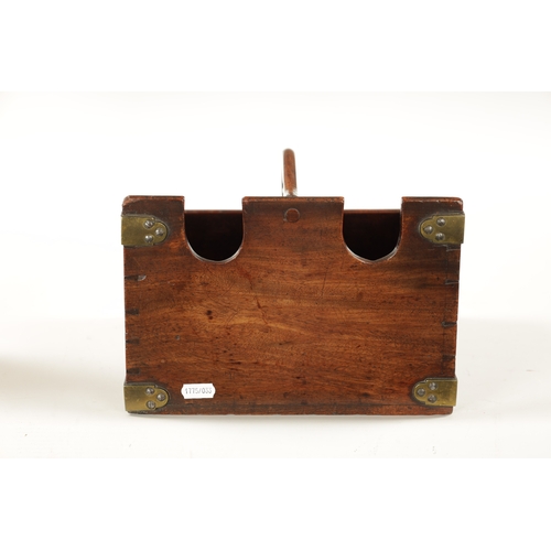 1098 - A GEORGE III BRASS BOUND MAHOGANY DOUBLE WINE BOTTLE CARRIER with raised centre carrying handle slot... 