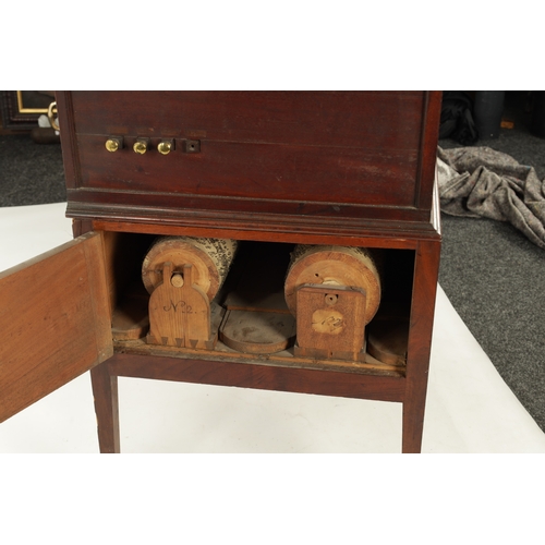 1115 - A GEORGE III INLAID SATINWOOD AND MAHOGANY BERREL ORGAN the cabinet with simulated gilt pipes to the... 