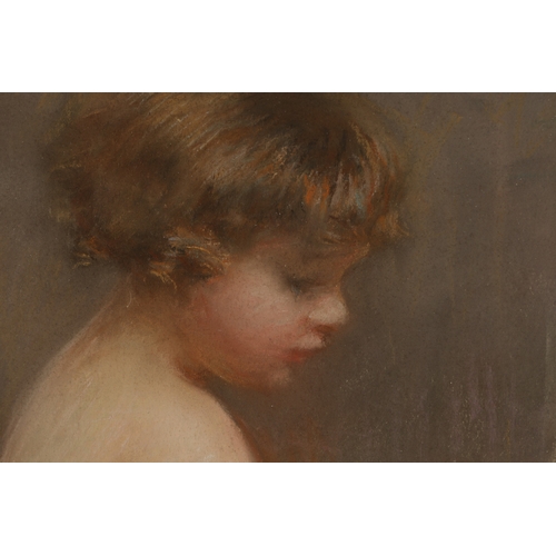 1150 - JANET CUMBRAE STEWART (AUSTRALIAN, 1883 - 1960) PASTEL ON PAPER depicting a nude child - in glazed g... 