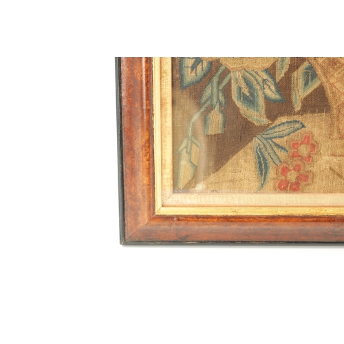 1155 - AN 18TH CENTURY FRAMED NEEDLEWORK PICTURE depicting a colourful flower basket on a shelf. Moulded wa... 