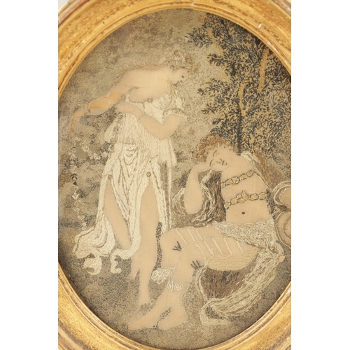 1190 - AN 18TH CENTURY SMALL OVAL TEXTILE PICTURE depicting two young ladies in a tree lined setting - in a... 