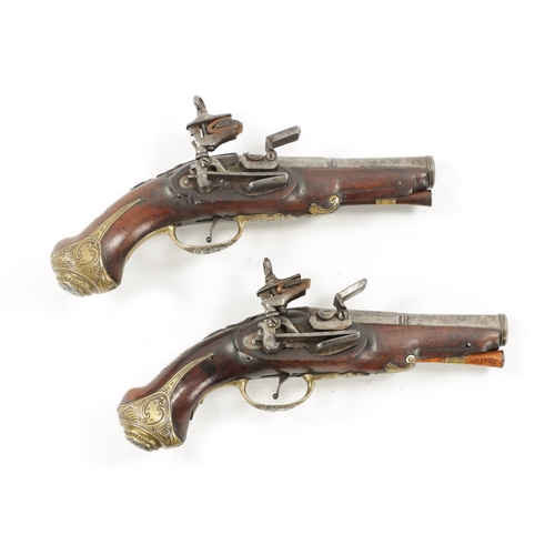 798 - A PAIR OF 18TH CENTURY BRASS MOUNTED SPANISH FLINTLOCK PISTOLS each fitted a two-stage steel barrel ... 