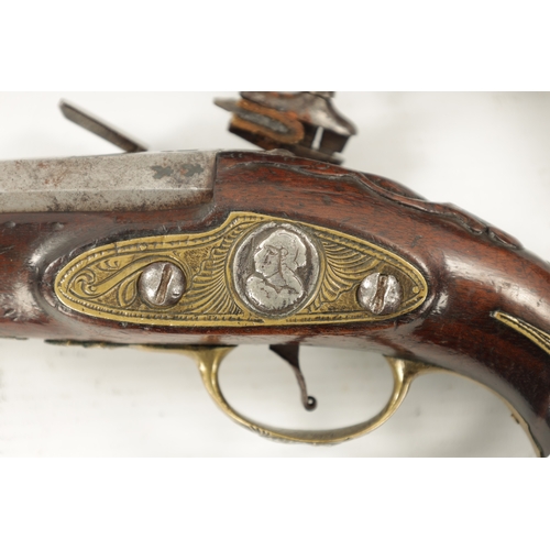 798 - A PAIR OF 18TH CENTURY BRASS MOUNTED SPANISH FLINTLOCK PISTOLS each fitted a two-stage steel barrel ... 