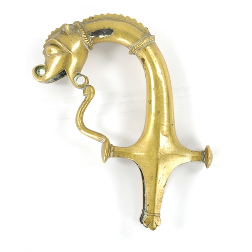 816 - A 19TH CENTURY INDIAN RAJPUT BRONZE SWORD HILT with dragons head top (19cm overall)