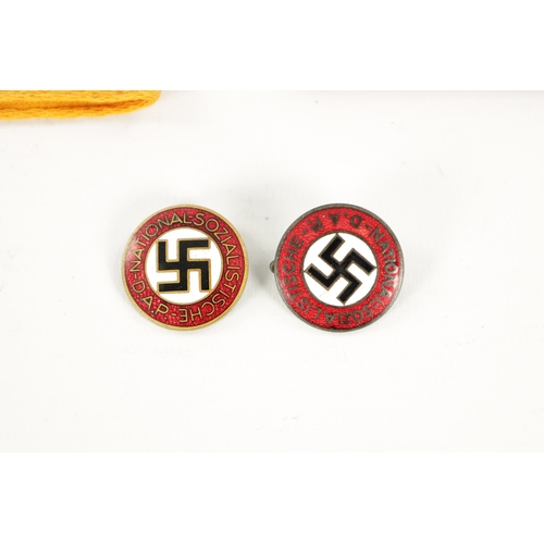 817 - A COLLECTION OF GERMAN WWII THIRD REICH ITEMS comprising of two arm bands and two enamel badges. (4)