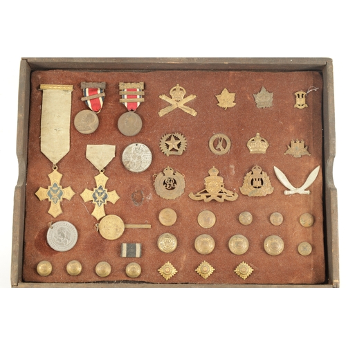 819 - A LARGE COLLECTION OF MILITARY MEDALS AND HAT BADGES displayed on three velvet lined trays