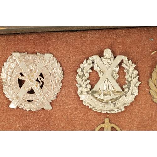 819 - A LARGE COLLECTION OF MILITARY MEDALS AND HAT BADGES displayed on three velvet lined trays