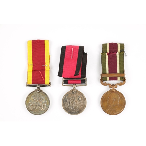 835 - A COLLECTION OF THREE MEDALS a China 1900 Medal presented to H.W. TURNER. PTE. R.M. H.M.S. ROSARIO. ... 