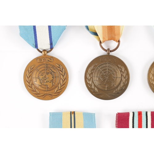 846 - A COLLECTION OF NINE UN SERVICE OF PEACE MEDALS from various countries (9)