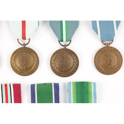 846 - A COLLECTION OF NINE UN SERVICE OF PEACE MEDALS from various countries (9)