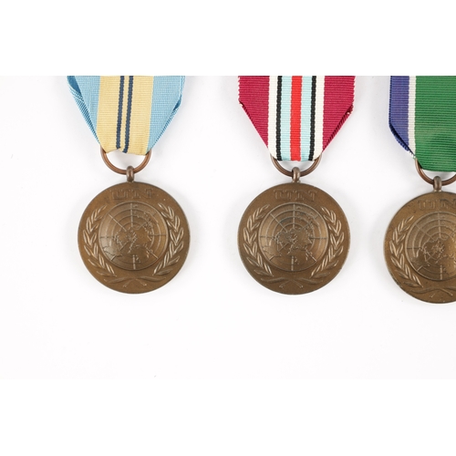 846 - A COLLECTION OF NINE UN SERVICE OF PEACE MEDALS from various countries (9)