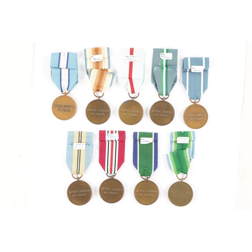 846 - A COLLECTION OF NINE UN SERVICE OF PEACE MEDALS from various countries (9)