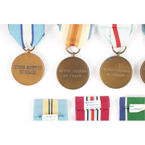 846 - A COLLECTION OF NINE UN SERVICE OF PEACE MEDALS from various countries (9)