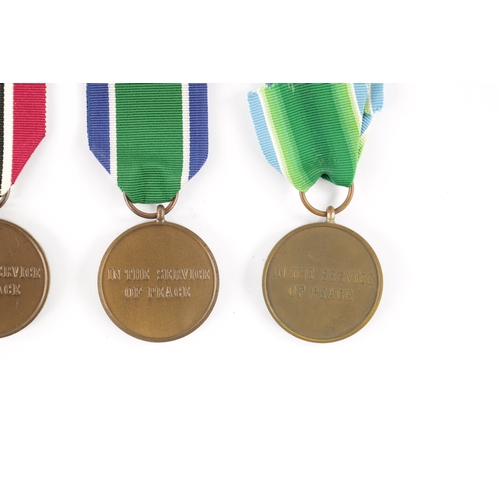 846 - A COLLECTION OF NINE UN SERVICE OF PEACE MEDALS from various countries (9)