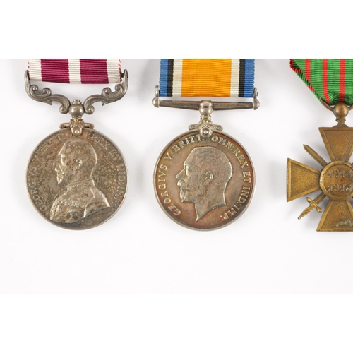 851 - A GROUP OF FOUR WW1 MEDALS comprising of a Long Service Medal awarded to 56199. S.SJT J. SIMPSON. R.... 