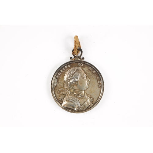 855 - A LARGE GEORGE III SILVER CARIB WAR MEDAL 1773 with chased bust of George III, the reverse showing B... 