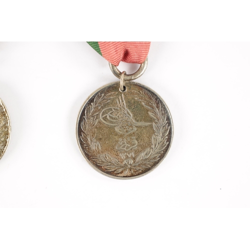 857 - A COLLECTION OF THREE TURKISH CRIMEA MEDALS two inscribed 'LA CRIMEA 1855' and one 'CRIMEA 1855' (3)... 