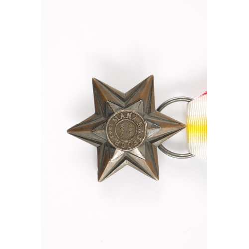 870 - A GWALIOR STAR 1843 MEDAL presented to 'Private James Holme. H.M. 39th Reg.' (50mm wide)