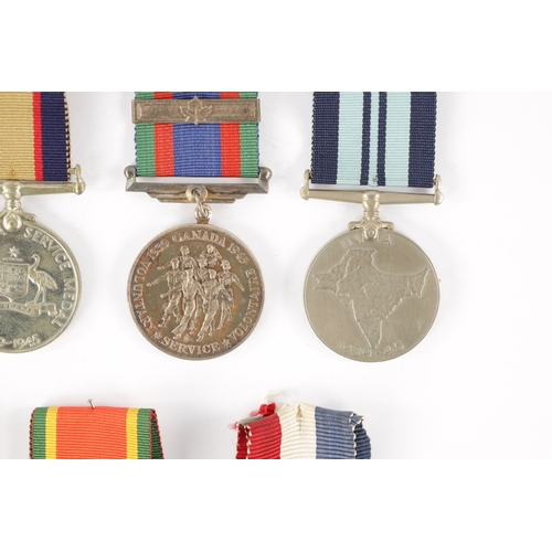 871 - A COLLECTION OF SEVEN WW2 SERVICE MEDALS for New Zealand, unnamed, South Africa, unnamed, India, unn... 