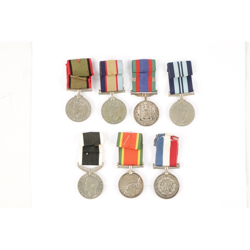 871 - A COLLECTION OF SEVEN WW2 SERVICE MEDALS for New Zealand, unnamed, South Africa, unnamed, India, unn... 