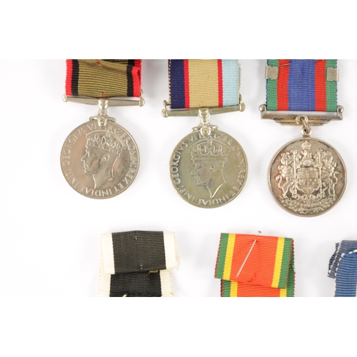 871 - A COLLECTION OF SEVEN WW2 SERVICE MEDALS for New Zealand, unnamed, South Africa, unnamed, India, unn... 