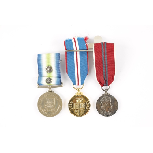 878 - A 1982 FALKLANDS WAR SOUTH ATLANTIC MEDAL WITH ROSETTE. Presented to OM F. KENNY. RFA. OLMEDA, toget... 