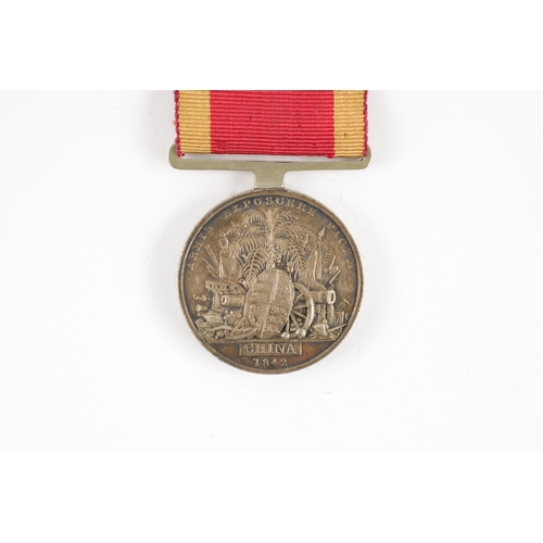 880 - A SECOND CHINA WAR MEDAL presented to JAMES ELELLOCK. H.M.S. CRUIZER. With bar suspension (36mm diam... 