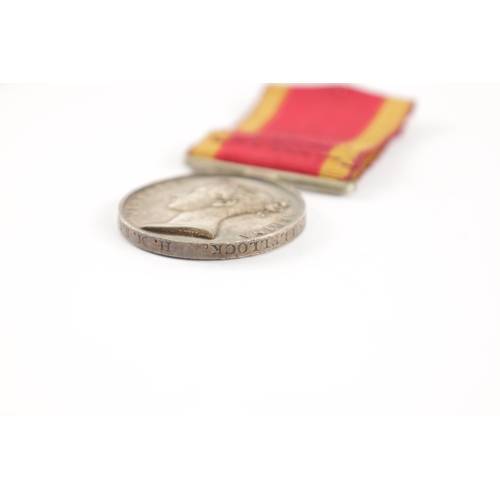 880 - A SECOND CHINA WAR MEDAL presented to JAMES ELELLOCK. H.M.S. CRUIZER. With bar suspension (36mm diam... 