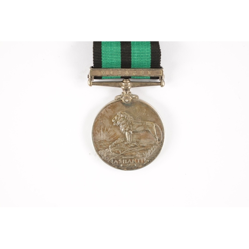 886 - AN ASHANTI MEDAL 1900 WITH CLASP presented to 390 PTE. JOHNNIE DAVIES. W. AFRICAN REGT. Clasp for 'K... 