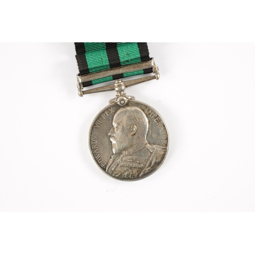 886 - AN ASHANTI MEDAL 1900 WITH CLASP presented to 390 PTE. JOHNNIE DAVIES. W. AFRICAN REGT. Clasp for 'K... 